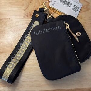 NWT Lululemon Dual Pouch Wristlet Black Gold Wordmark NWT
